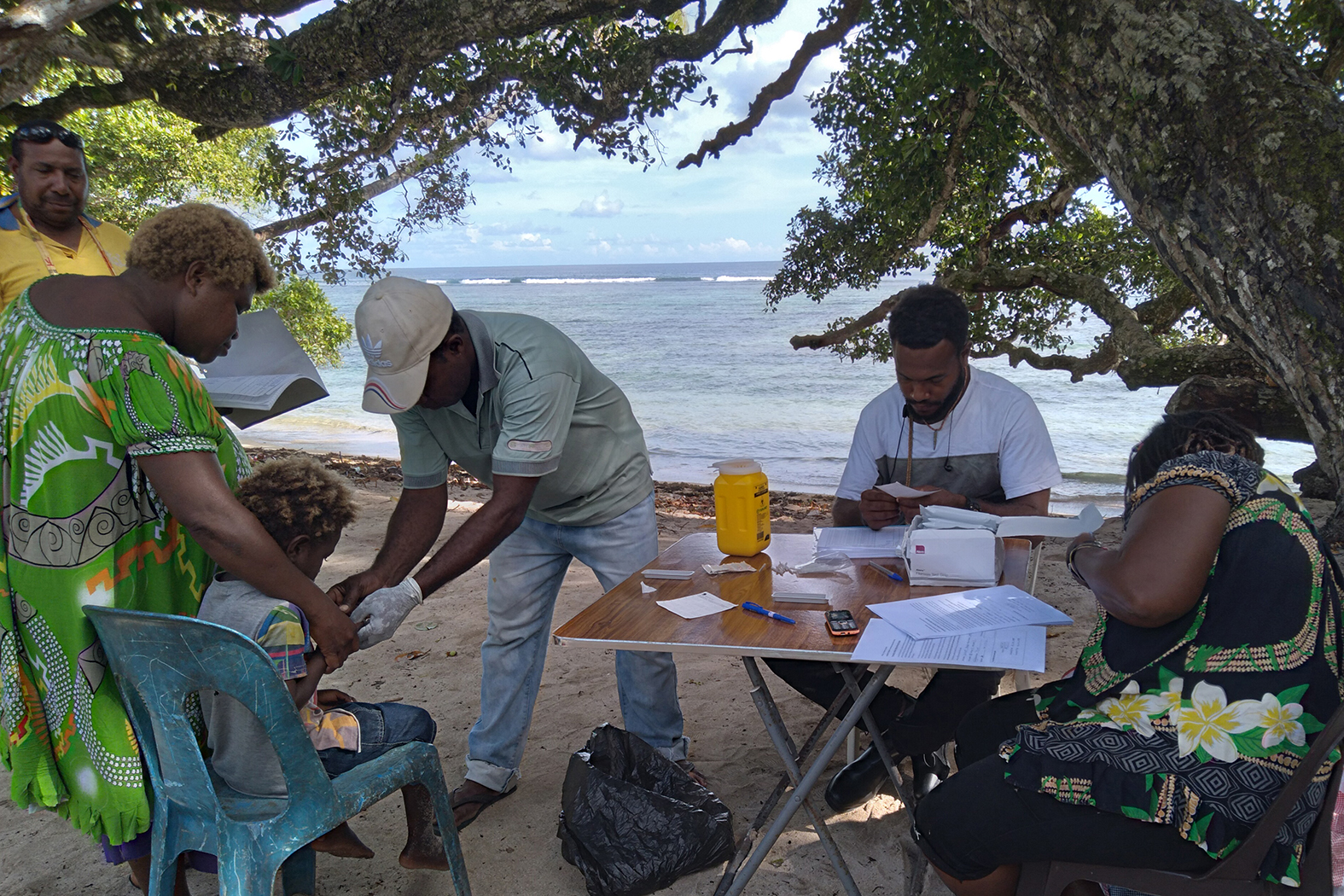 Mass Drug Administration campaign with the IDA (a combination of albendazole, DEC and ivermectin) triple therapy in the East New Britain Province, Papua New Guinea.