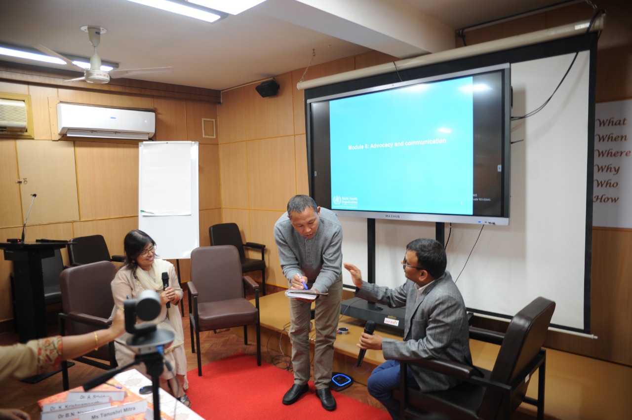 Participants in a roleplay on advocacy and communication